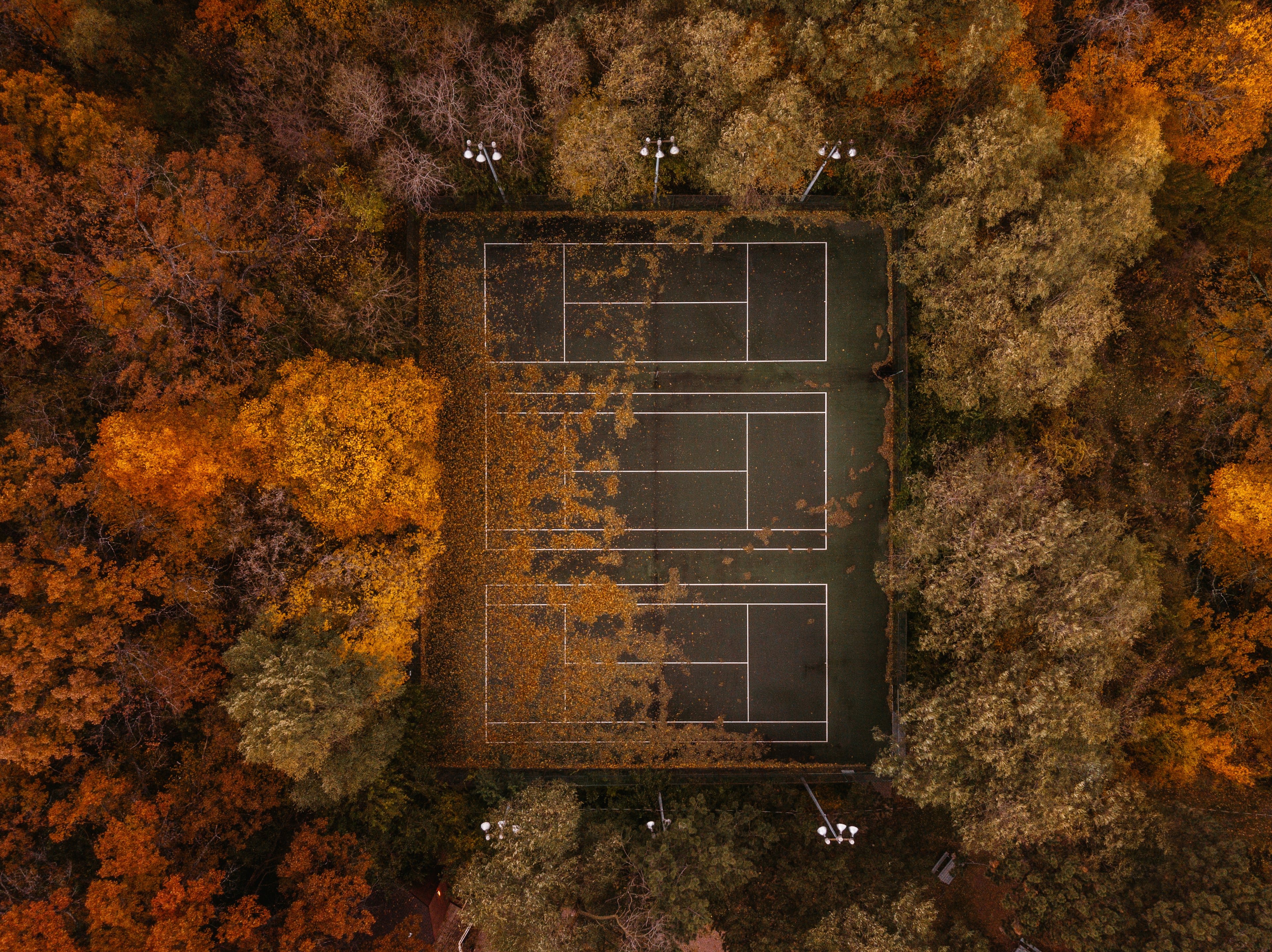 Tennis courts in Autumn aerial view