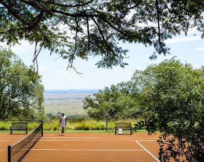 Tennis court at Singita Sasakwa Lodge in the Serengeti National Park, Tanzania
