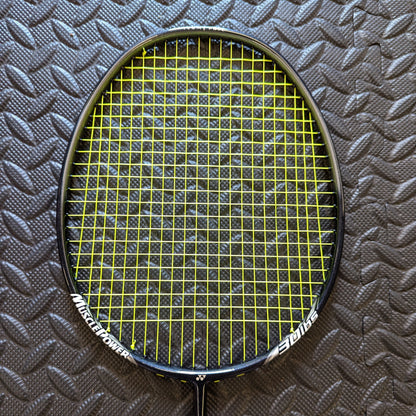 Yonex badminton racket restrung with Yonex BG80 string in yellow with a black stencil