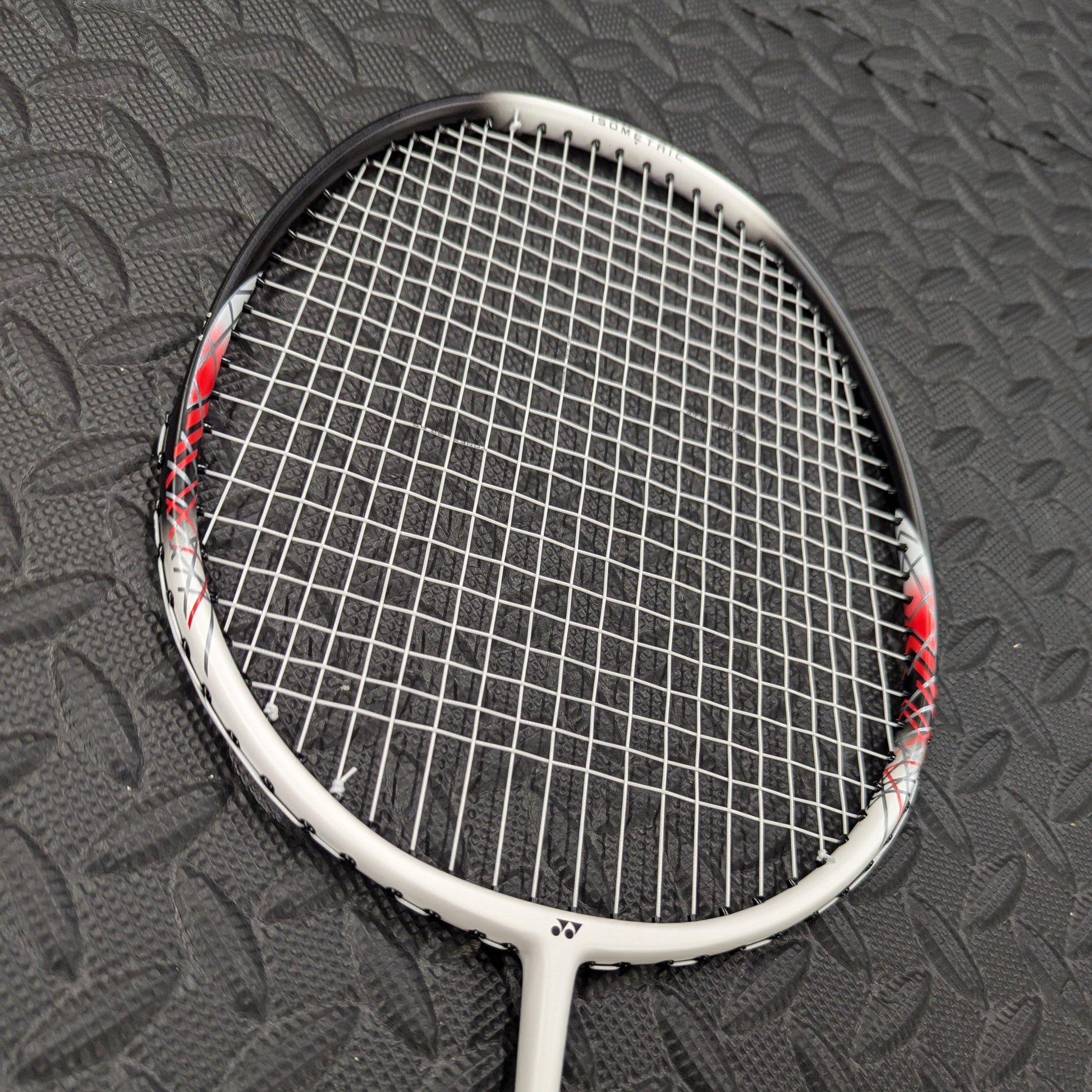 Yonex badminton racket restrung with Yonex BG65 string