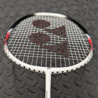 Yonex badminton racket restrung with Yonex BG65 string and red stencil