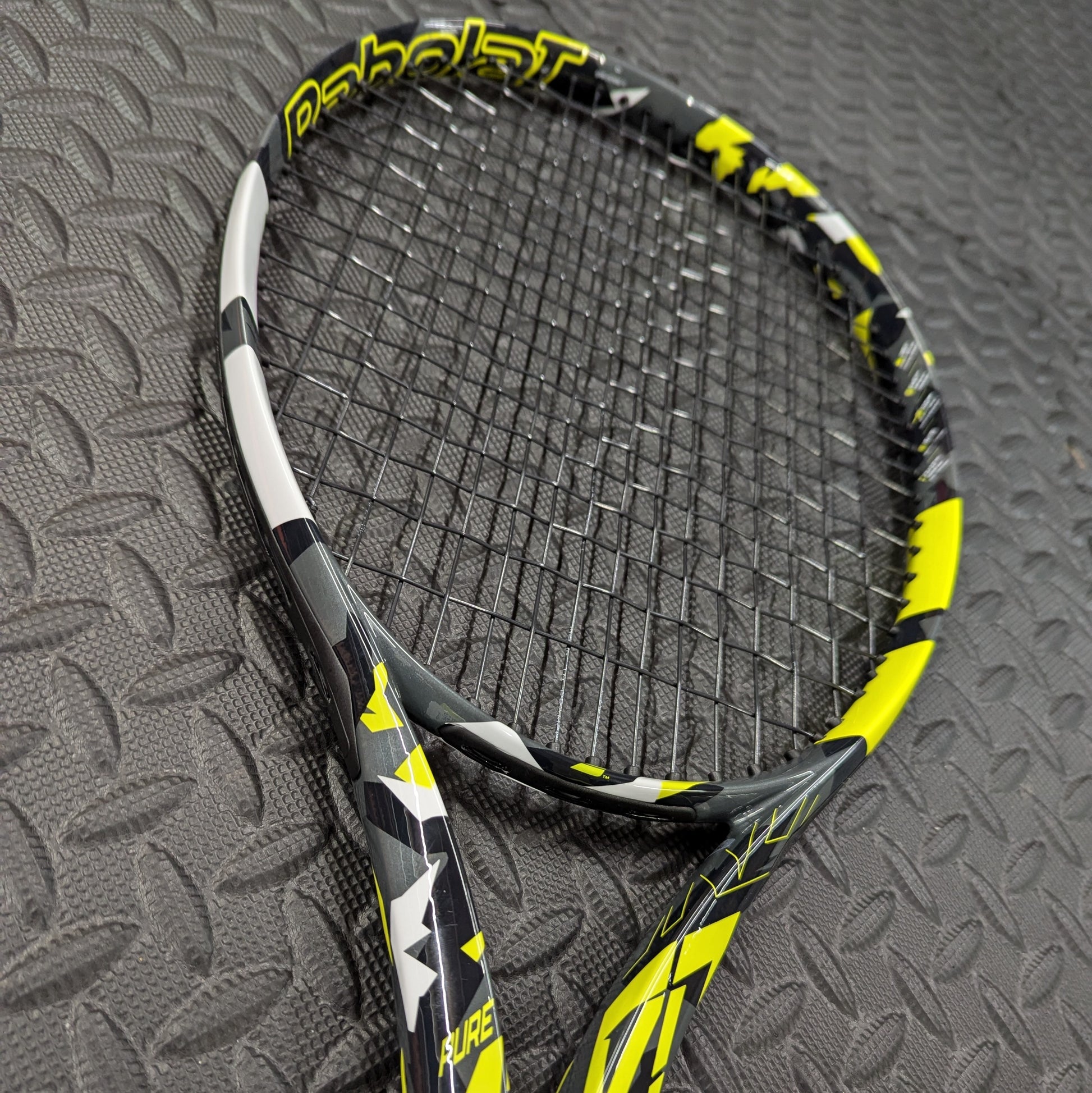 Babolat Pure Aero tennis racket restrung with Babolat RPM Blast string